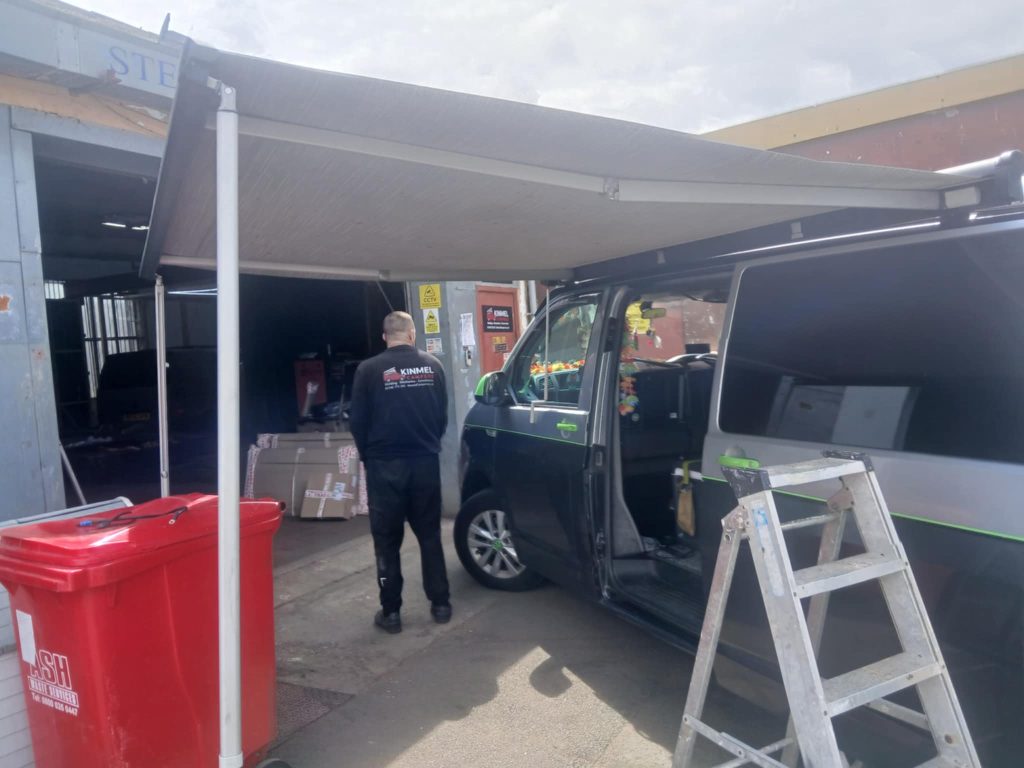 Thule Omnistor awning extended on VW campervan in Rhyl