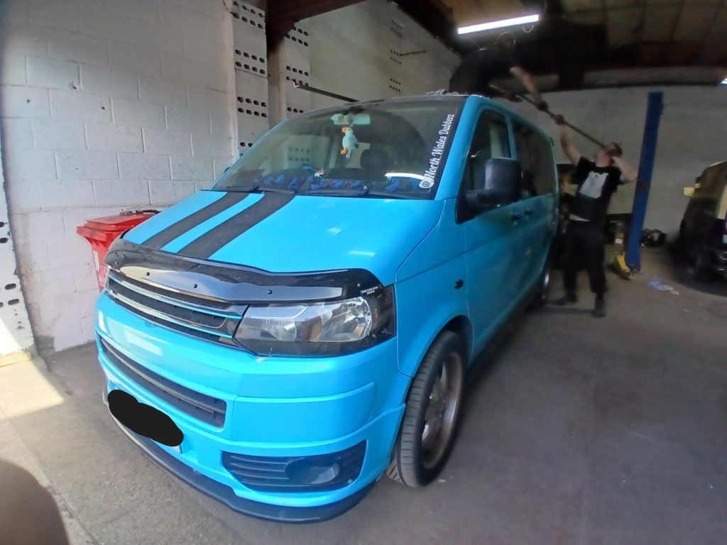 VW T5 campervan roof cut underway for pop top roof installation