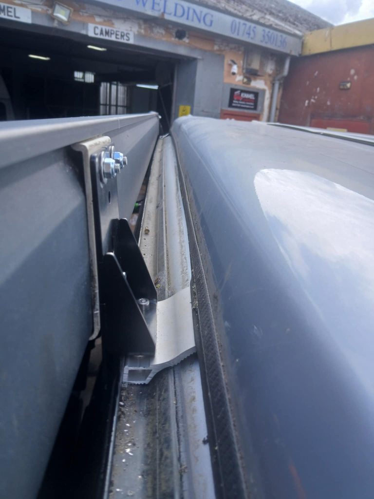 Clearcut Conversions bracket fitted on campervan rail North Wales
