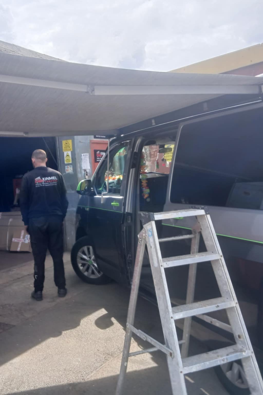 VW campervan roof rail inspection before Thule Omnistor fitting in Rhyl