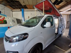 Pop Top Roof Supplied and Fitted to a Vivaro with Anthracite Carpet and Red Canvas