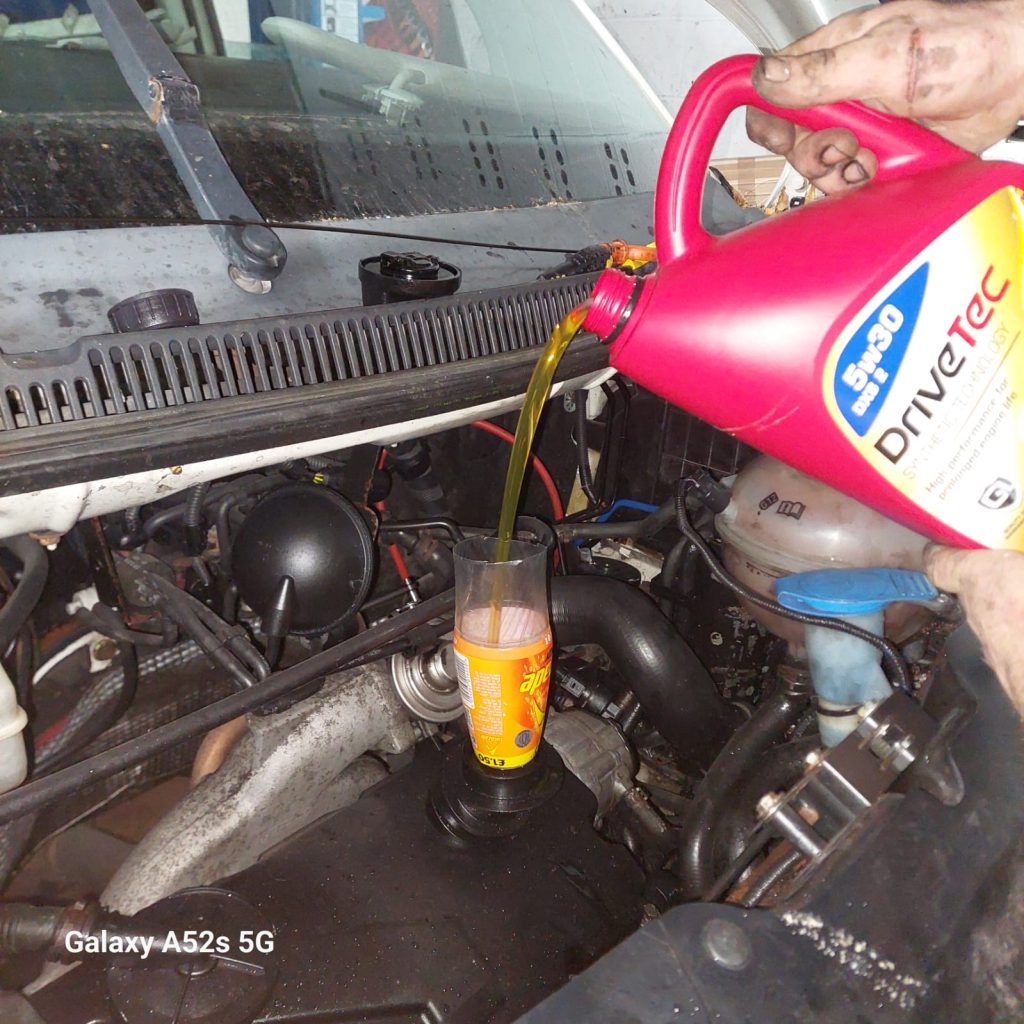 Filling Fresh Oil for a VW T5 engine service 