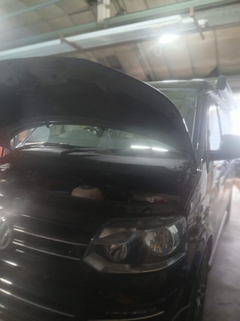 VW T6 receiving full engine service alongside complete underseal protection in North Wales