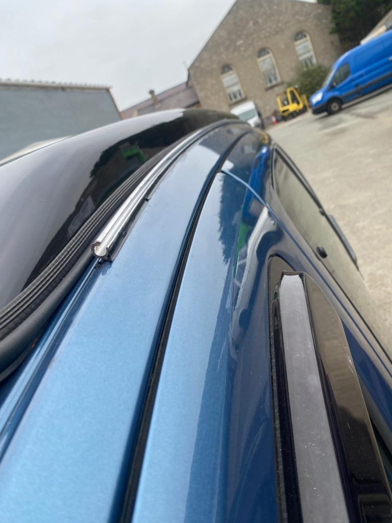 Close-up of Citroën Berlingo awning rail fitting along roofline
