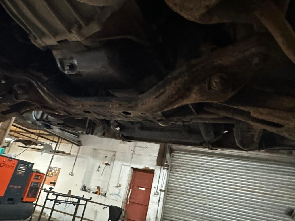 Campervan chassis and floorpan before professional underseal service and corrosion protection