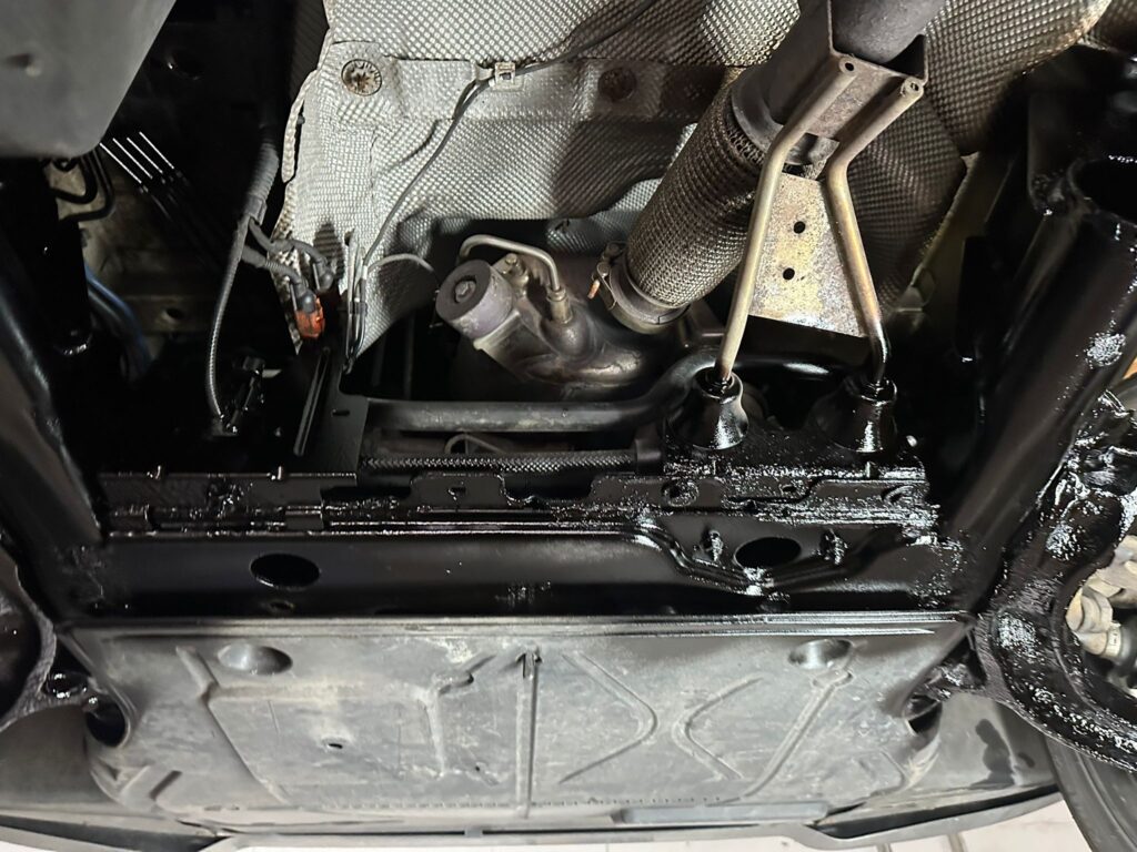 freshly undersealed VW T5 underside with protective coating applied