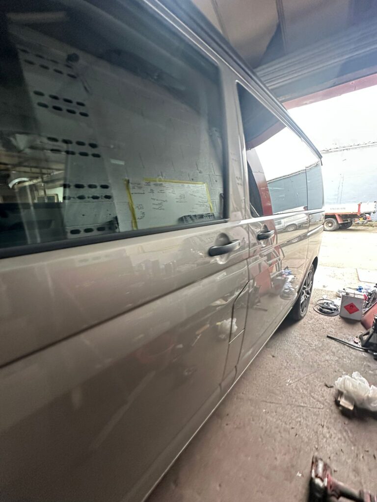 VW T5 van in workshop ready for underbody inspection and treatment