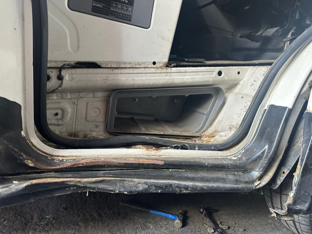 Detailed view of welded sill section on Volkswagen Crafter during repair process