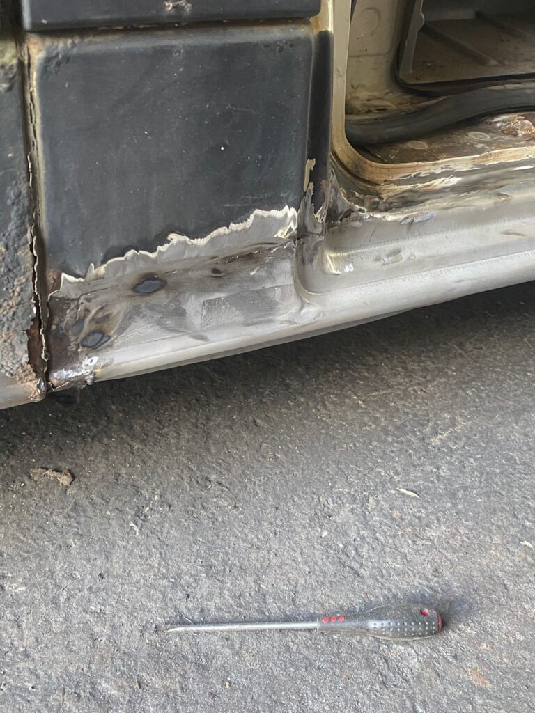 Completed sill welding repair on Volkswagen Crafter with protective coating applied