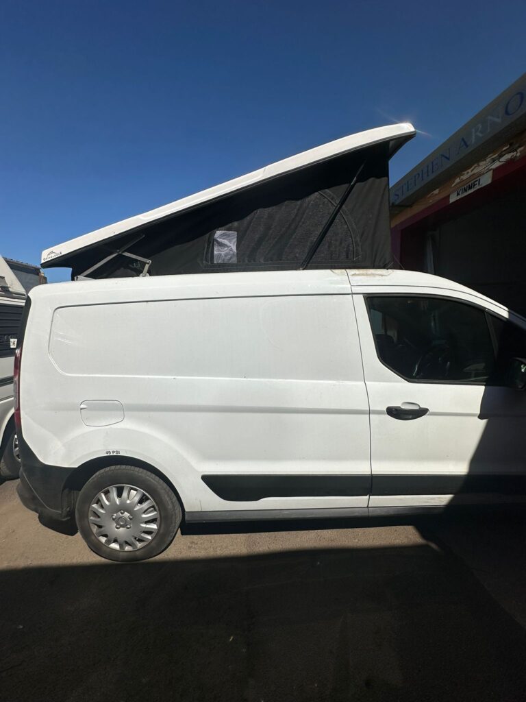 Side view of Ford Transit Connect with newly fitted pop top roof conversion by Kinmel Campers